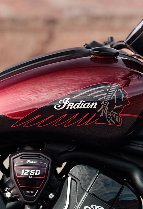 Side profile of the hand-painted tank on a 2026 Indian Scout Bobber 125th Anniversary Edition cruiser motorcycle.