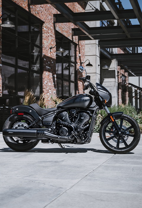 Side profile of a 2026 Indian Sport Scout Sixty cruiser motorcycle in the black smoke colorway.