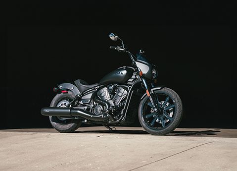 3 2026 Indian Sport Scout Sixty cruiser motorcycles driving down the highway.