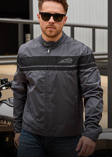 Man wearing leather Indian Motorcycle jacket. 