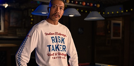 Man wearing Indian Motorcycle x RVSO collection t-shirt. 