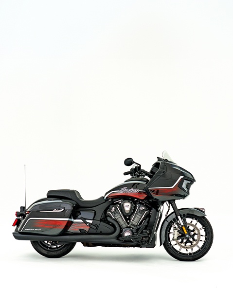 Side view of a parked Indian Challenger Signature Series motorcycle.