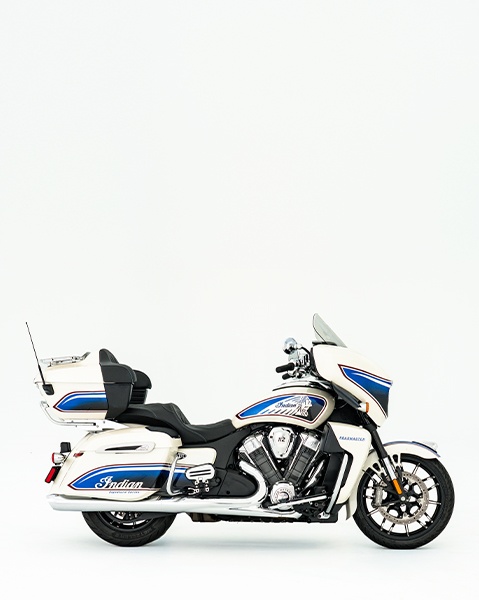 Side view of a parked Indian Roadmaster Powerplus Signature Series motorcycle.