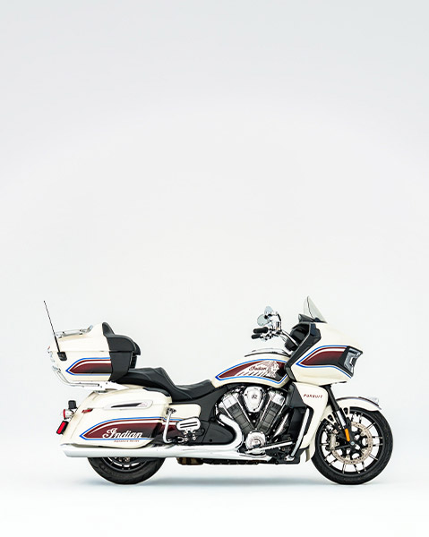 Side view of a parked Indian Pursuit Signature Series motorcycle.