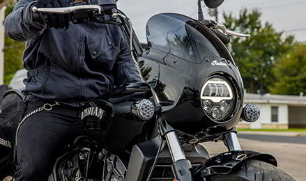 A biker using his Indian Motorcycle.