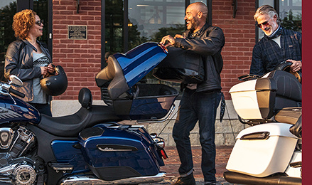 Riders packing their Indian Motorcycles with essentials for a group ride.