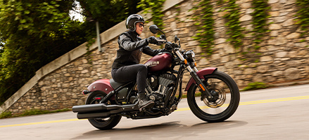 Red Cruiser motorcycle on the road. 