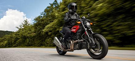 Black and red standard motorcycle. 