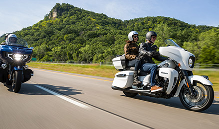 Three bikers using their Indian Motorcycle vehicles on the highway