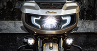 front closeup of the jack daniels motorcydle, showing all frontal lights on