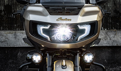 front closeup of the jack daniels motorcydle, showing all frontal lights on