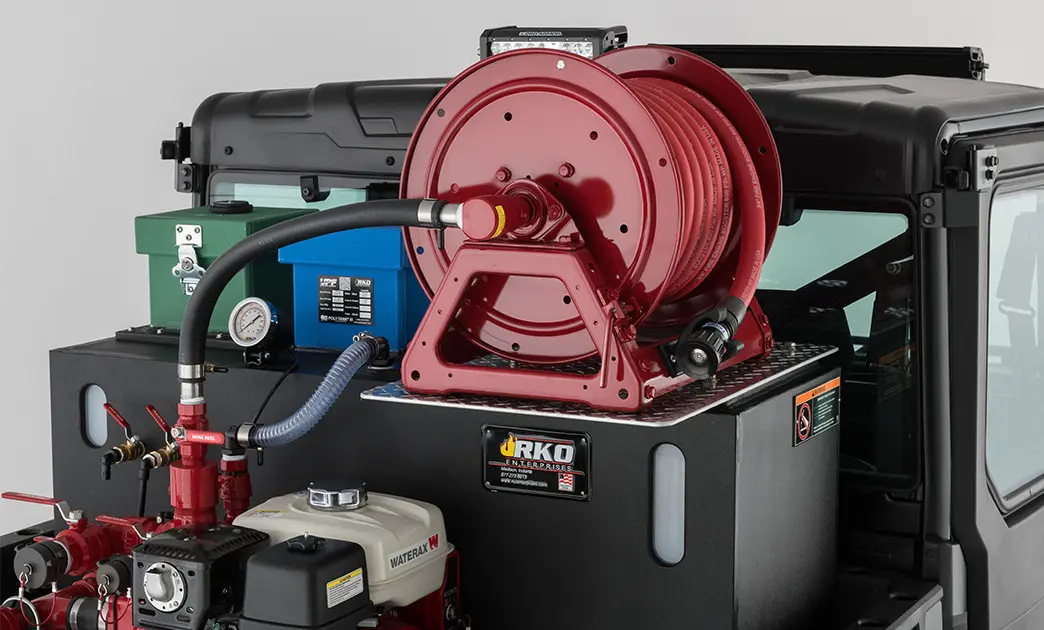 hose reel in the cargo box of a polaris ranger