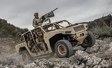 soldiers crusing in the dagor a1 tactical vehicle on rocky terrain
