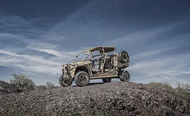mrzr diesel parked on a rocky hill