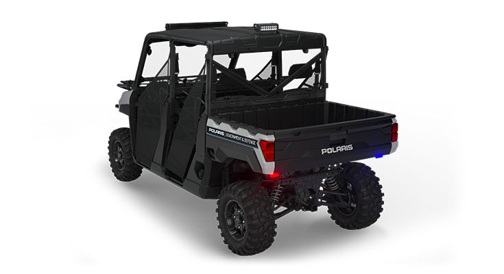 Rear view of a polaris ranger crew xp 1000 eps utv with the deluxe patrol package installed