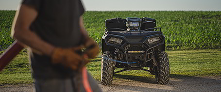 A Polaris Sportsman 450 showing off the winch