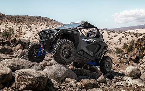 polaris rzr xp 1000 agilely traversing rocky terrain