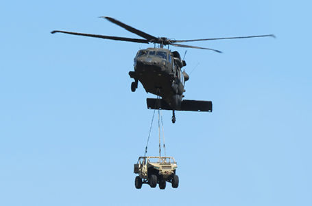 dagor a1 tactical vehicle being transported by a helicopter