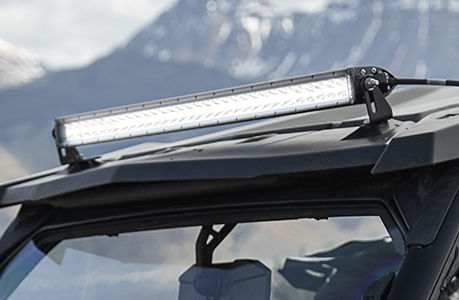 Polaris General 1000 side by side with a light bar installed on the roof