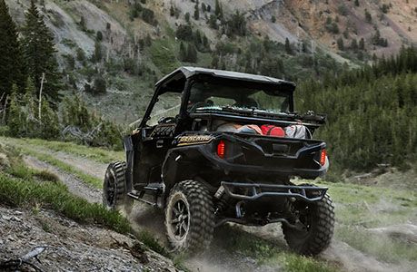 Lock & ride storage rack installed in the cargo box on a Polaris General XP 1000 side by side