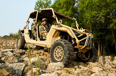 fully loaded mrzr alpha 4 performing over rocky terrain