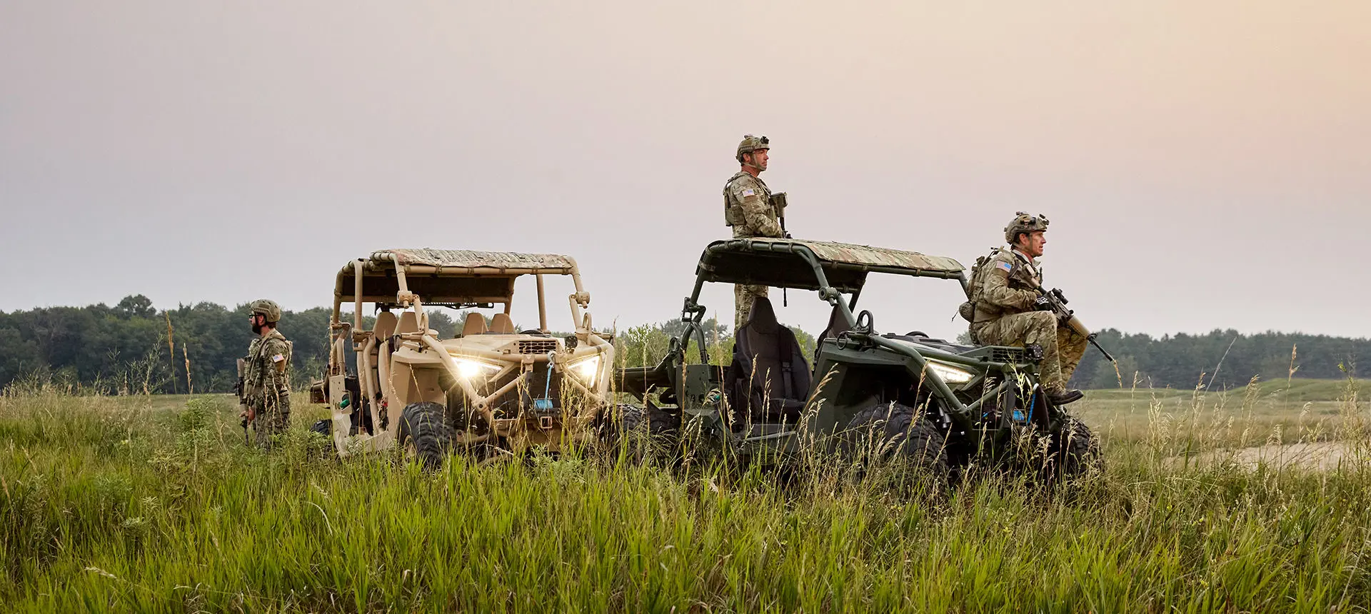 soldiers near 2 mrzr alpha tactical vehicles