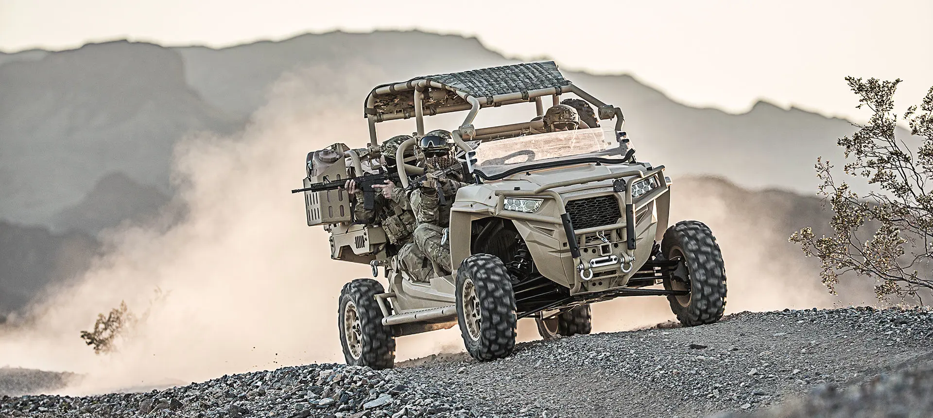 fully loaded mrzr diesel climbing over rocky terrain
