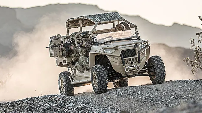 fully loaded mrzr diesel climbing over rocky terrain