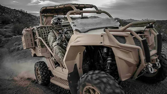 soldiers riding in a mrzr diesel tactical vehicle