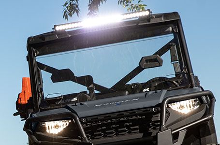 close up of a bar light installed on the roof a ranger 1000