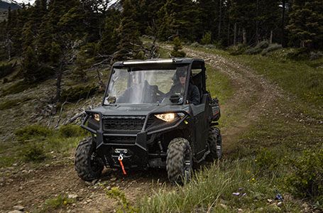 a rangre 1000 riding on a trail