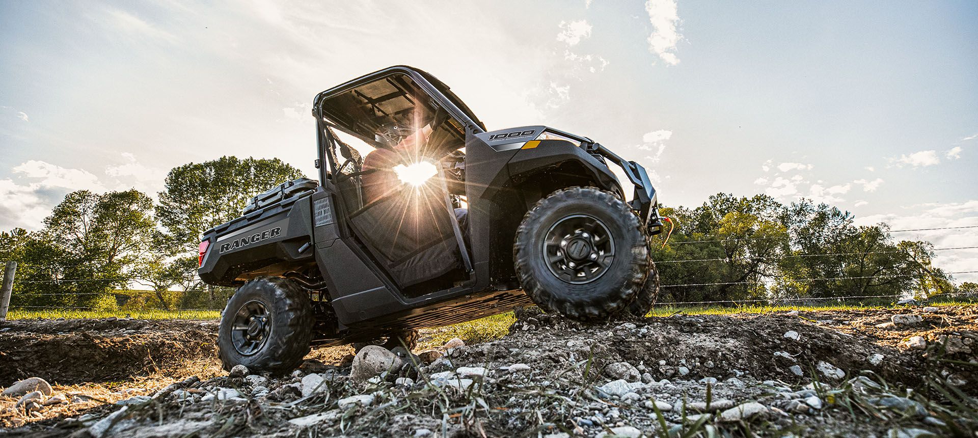 Ranger 1000 driving over rocks