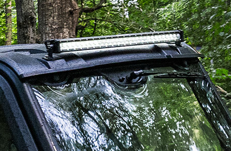 illuminated headlights and brush guard on the ranger sp 570 utv