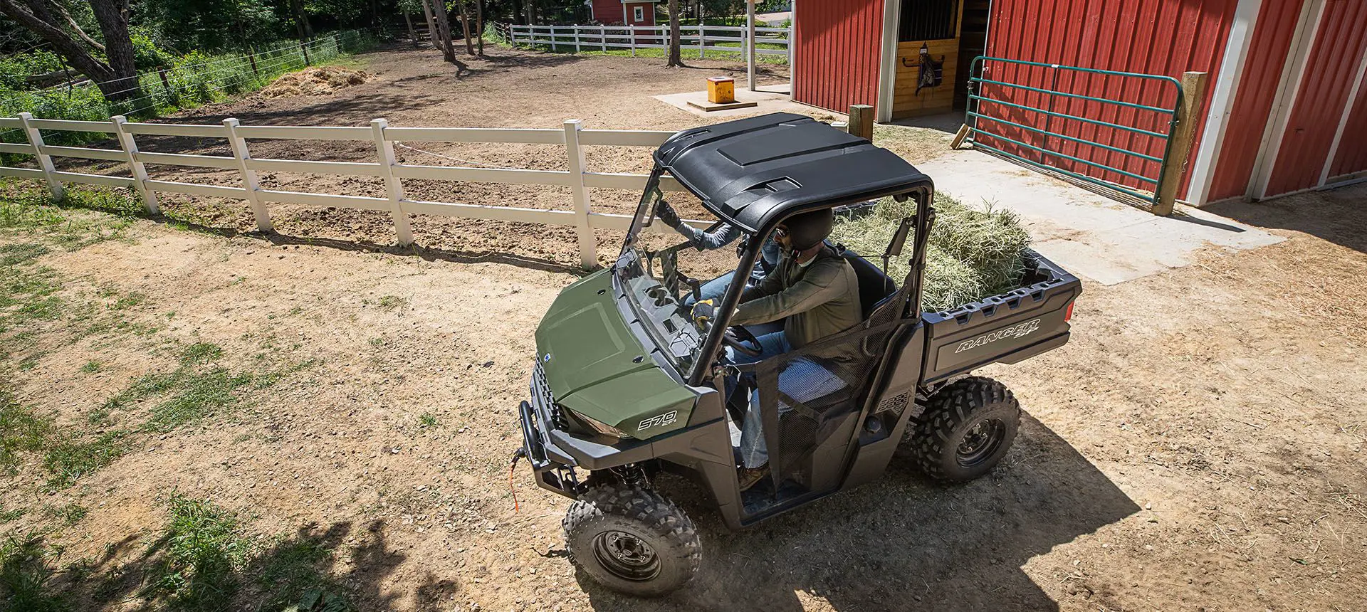 RANGER SP 570 taking a tight turn on a farm
