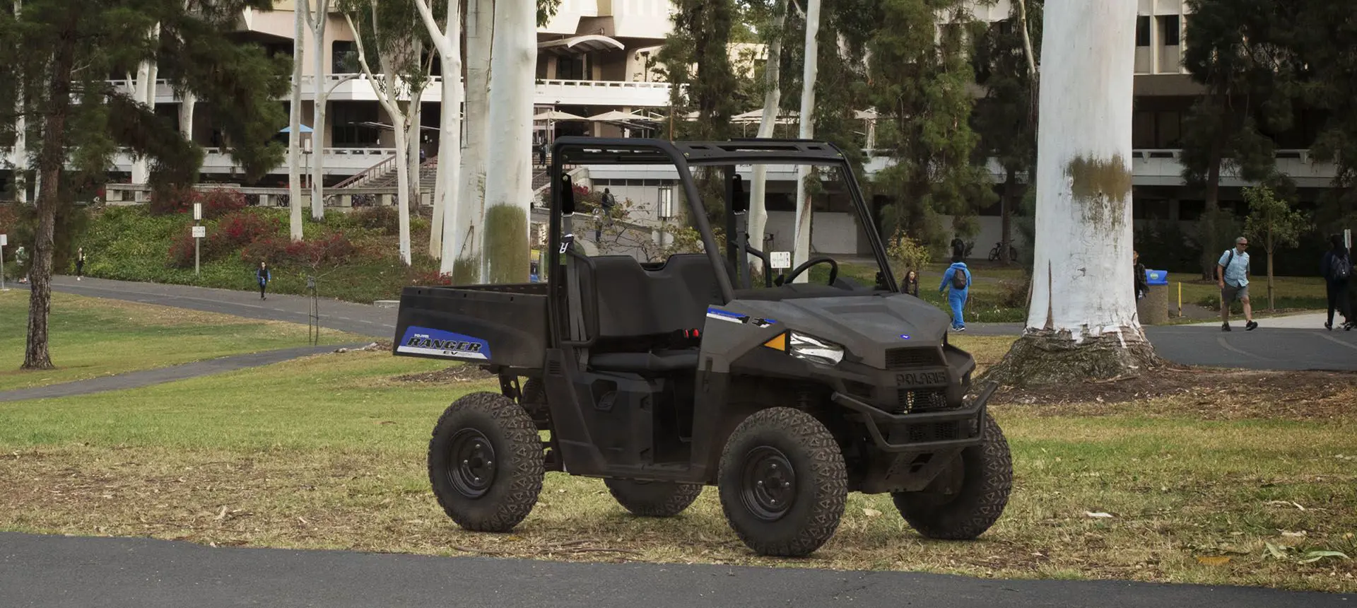 polaris ranger ev electric utv parked on a college campus