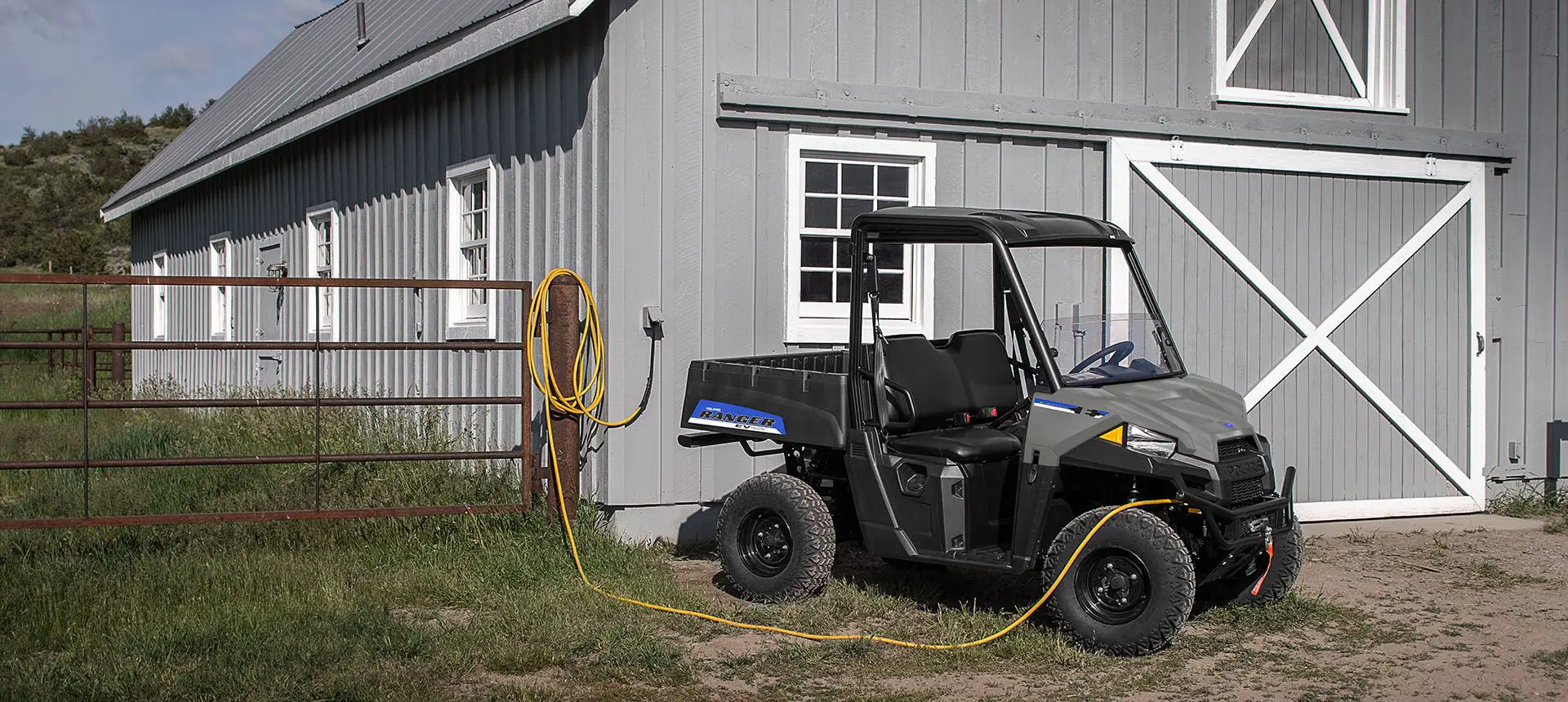ranger ev electric utv charging on a farm