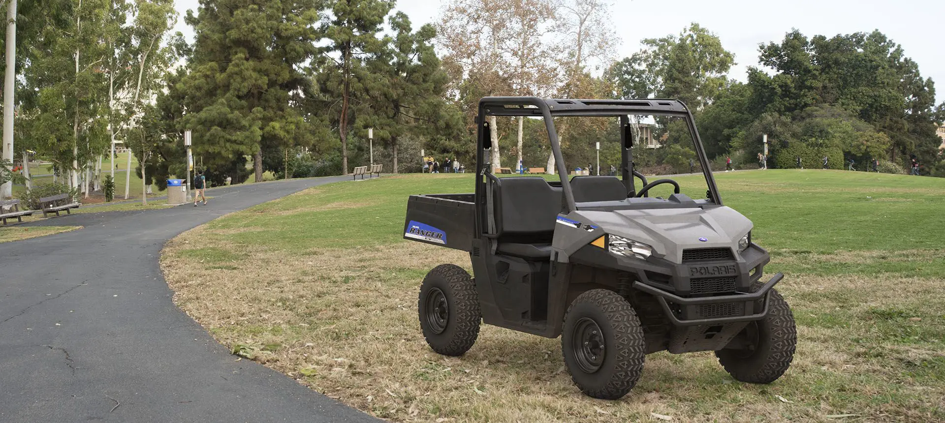 ranger ev electric utv parked in a city park