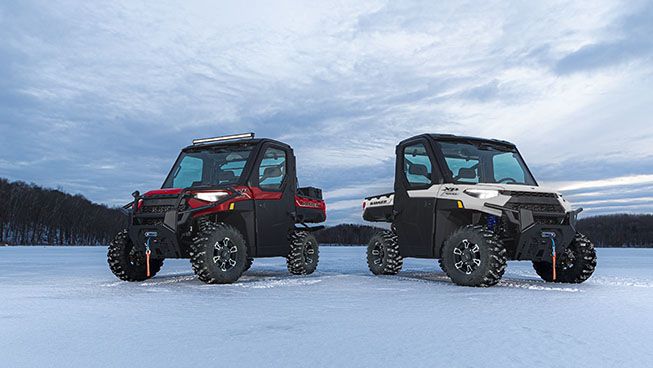 two ranger xp 1000 on the snow
