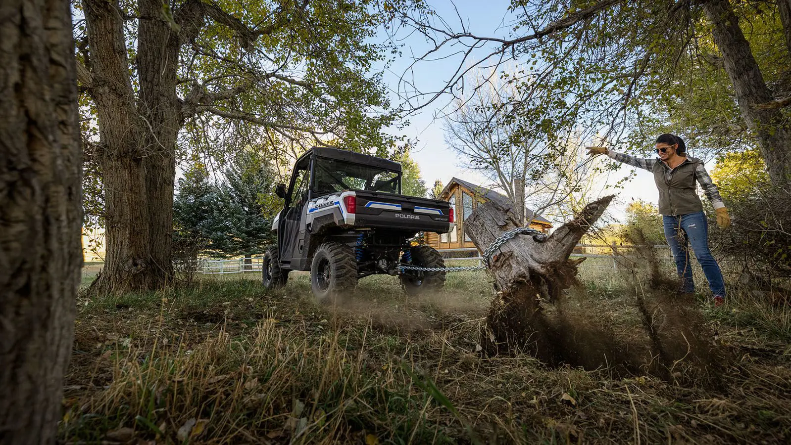 ranger xp kinetic side by side pulling out a stump