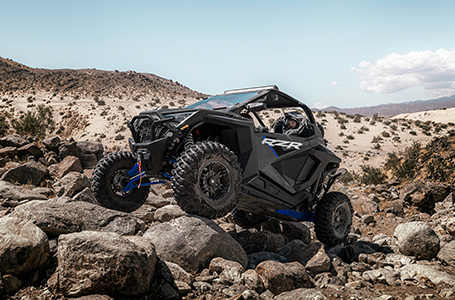 rzr pro xp riding over rocky terrain with ease