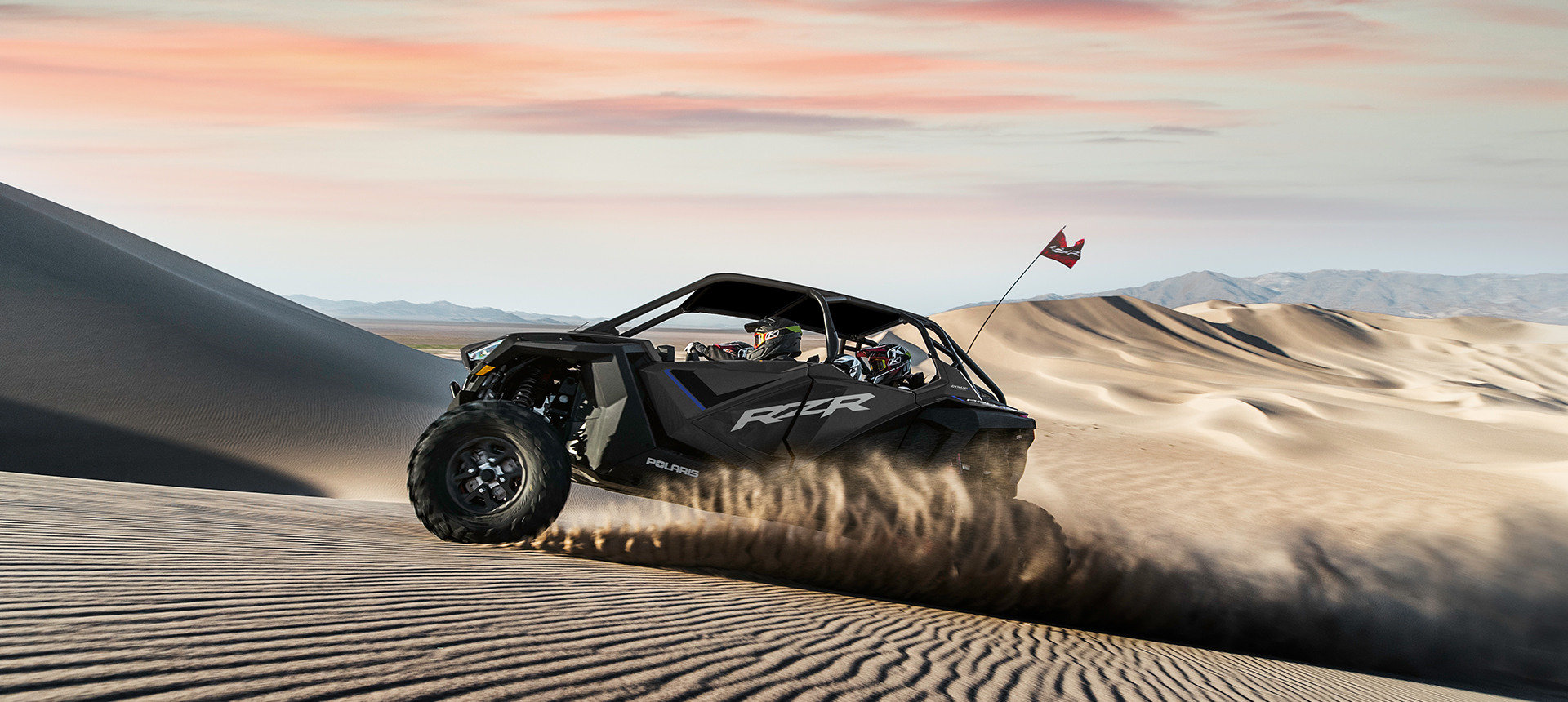 RZR Pro XP riding uphill on a dune