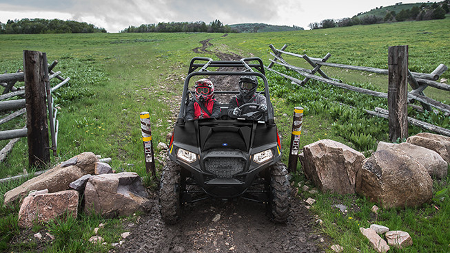 RZR trail 570 entering a narrow gate
