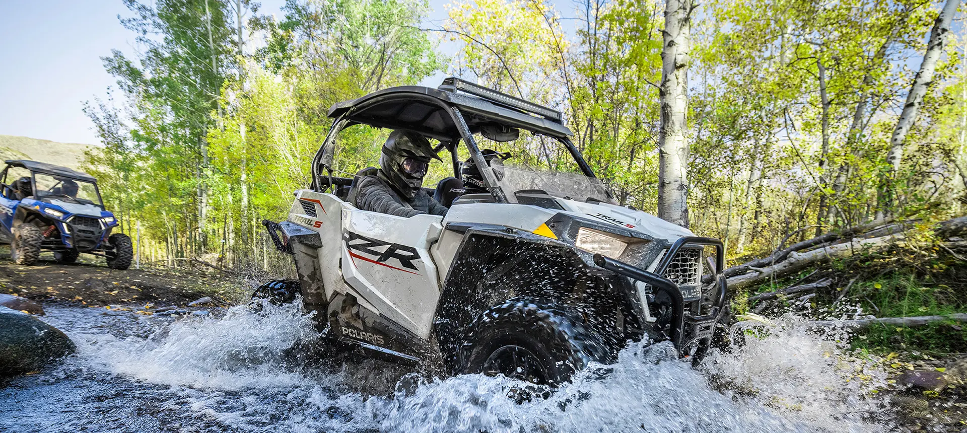 RZR trail driving through standing water
