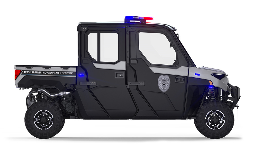 Side view of a polaris ranger crew xp 1000 eps northstar hvac edition utv with the premium patrol package installed