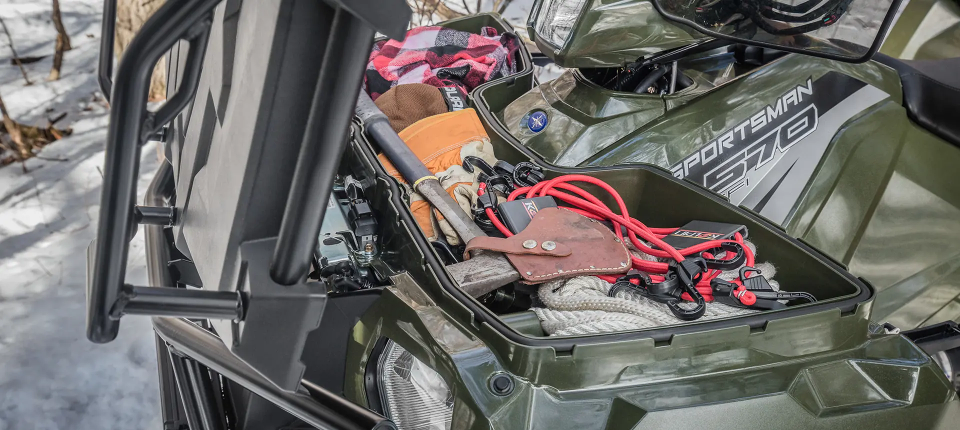 cargo area in the front of a sportsman 6x6 570 atv