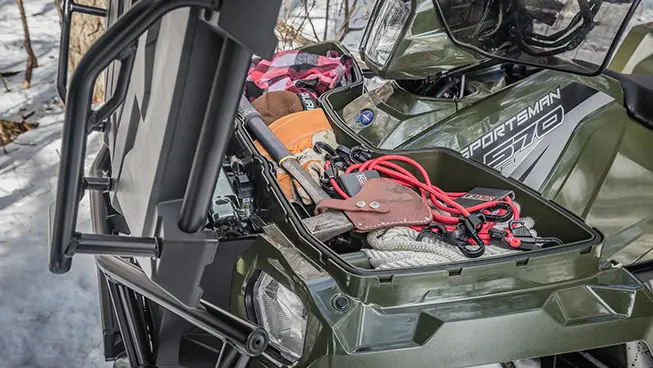 cargo area in the front of a sportsman 6x6 570 atv
