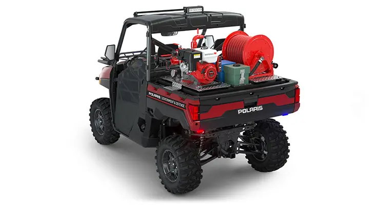 Rear side view of the cargo box with firefighting kit on a polaris RANGER XP 1000 Premium with the Basic Firefighting Package