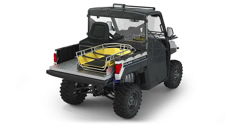 Rear side view of the cargo box with rescue skid and attendant seat on a polaris RANGER XP 1000 Premium with the Deluxe Rescue and Patrol Package