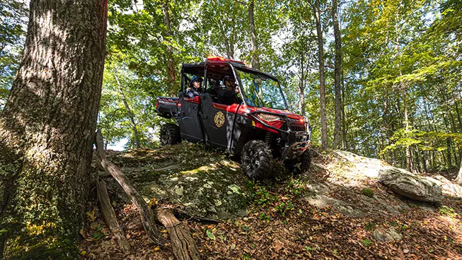 Fire & Rescue vehicle going down the forest