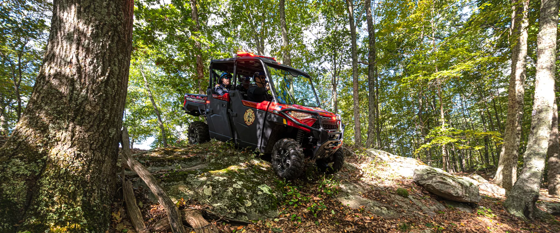 Fire & Rescue vehicle going down the forest